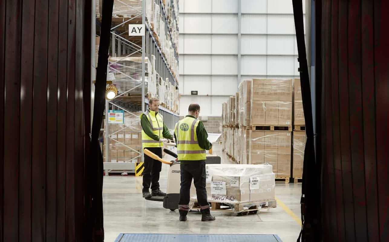 Workers in an e-commerce logistics warehouse