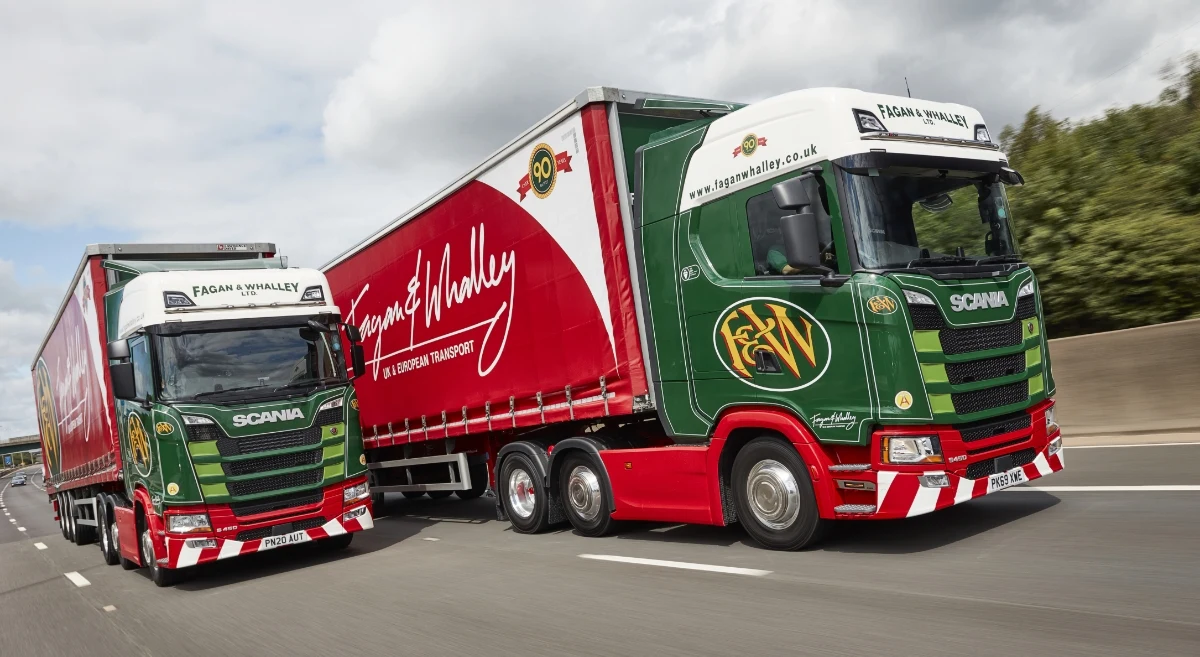 Two fagan & whalley vehicles on the road|driver yawning at the wheel|driver yawning at the wheel|